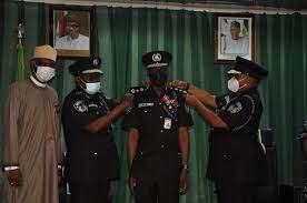 AIG decorates 14 promoted police officers